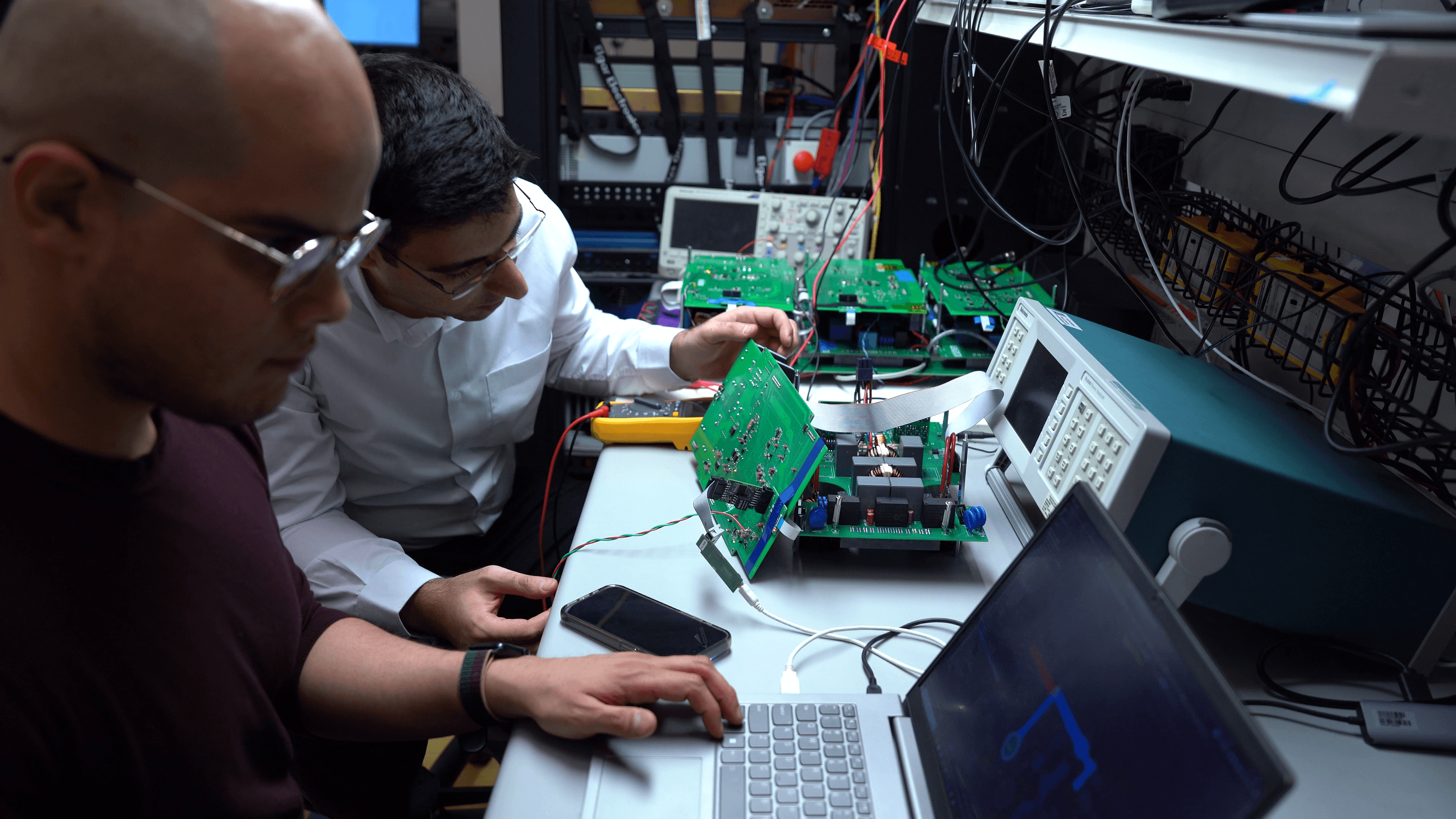Engineers working on circuit hardware